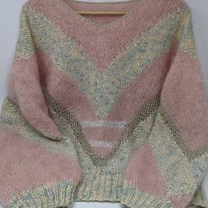 Pink fuzzy knitted sweater